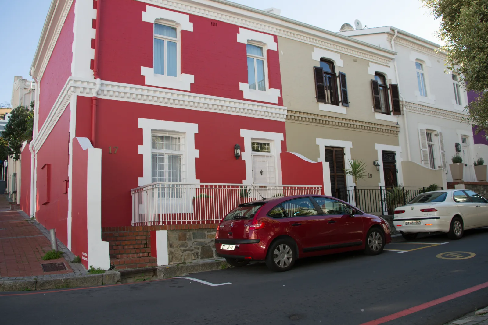 A red and white heritage corner house in De Waterkant