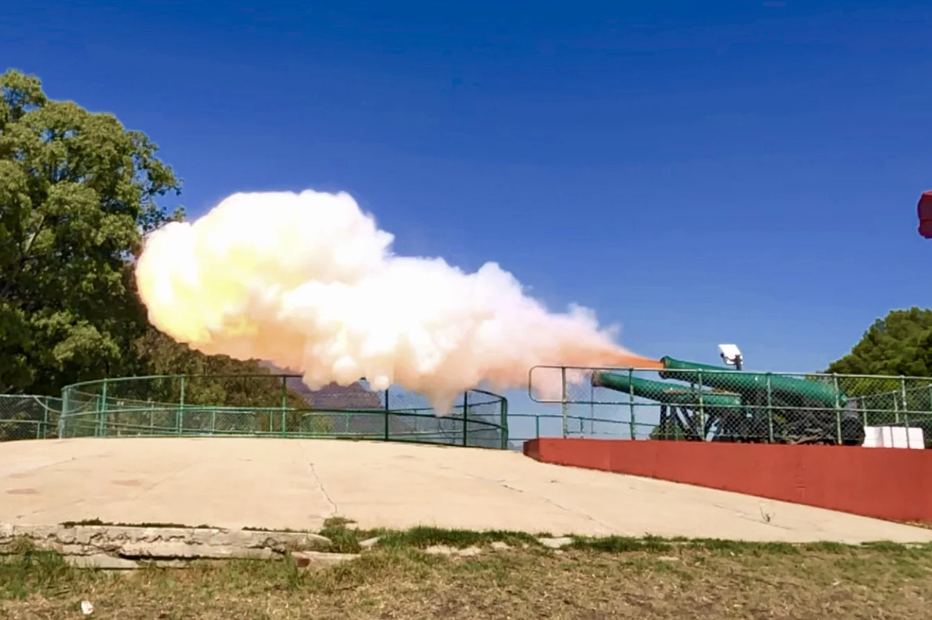 The Noon Gun firing from Signal Hill above Cape Town